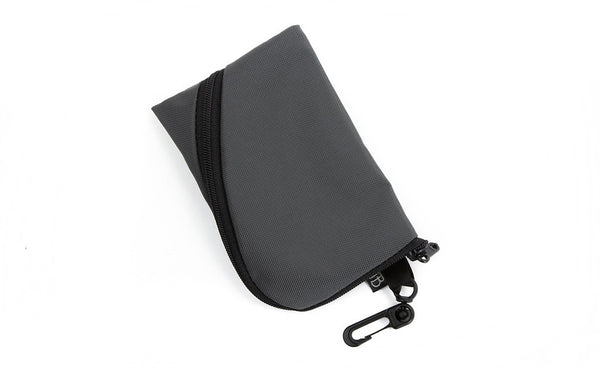 A Mini Ghost Whale Pouch in Nebulous Grey (dark grey).